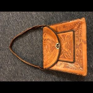 carved leather purse